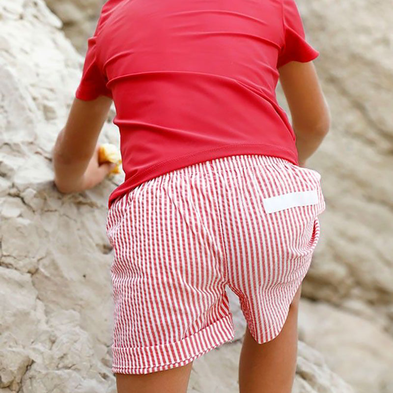 Seersucker stripy swim shorts for boys in Pepper red